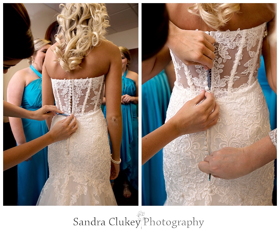 Finishing touches on bridal dress