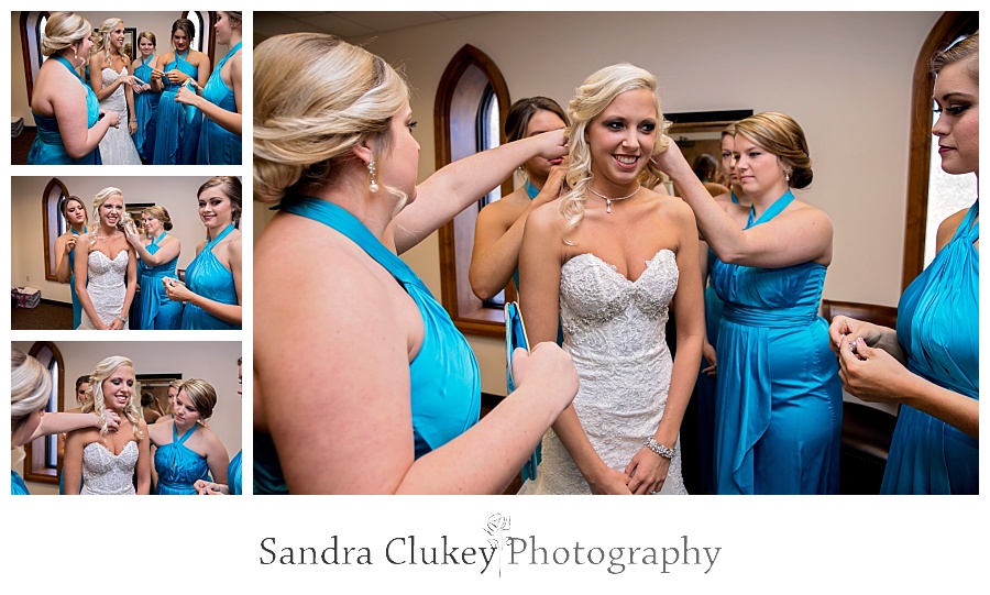 Bridesmaids helping bride