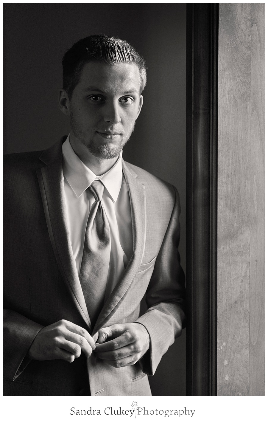 Handsome Groom by window