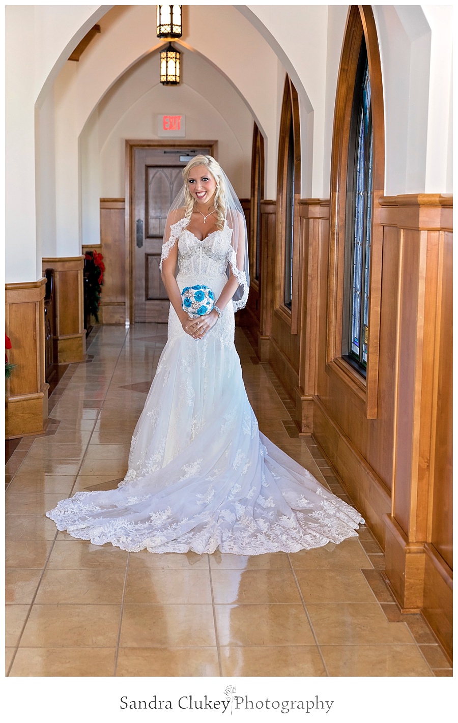 Dazzling bride in church aisle