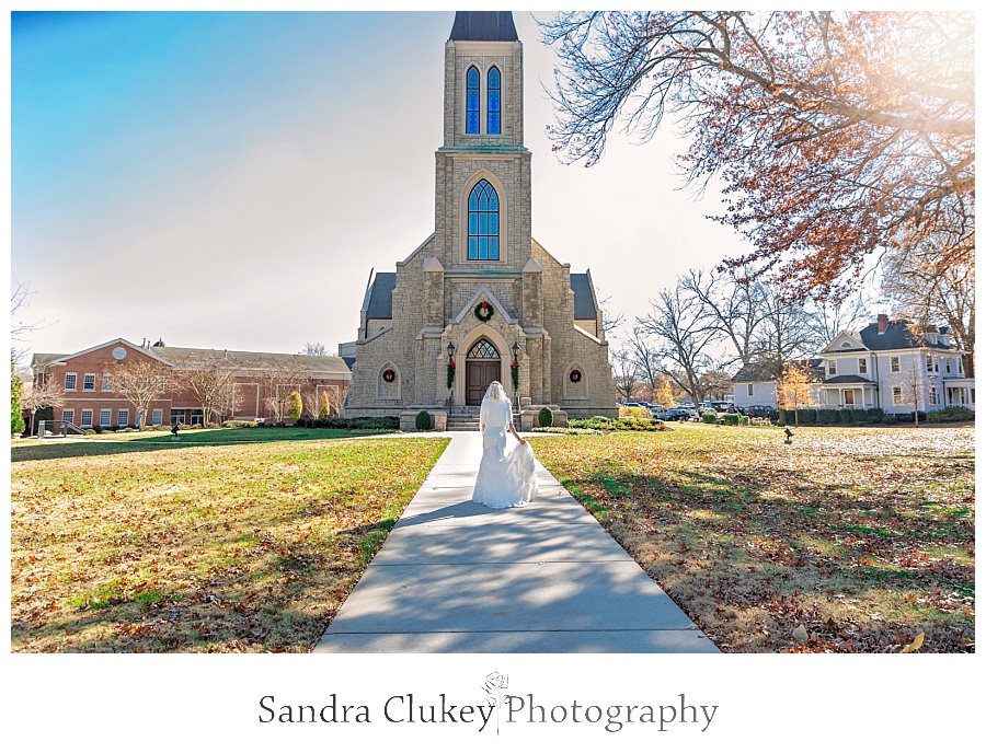 Bride walks toward Lee University Chapel