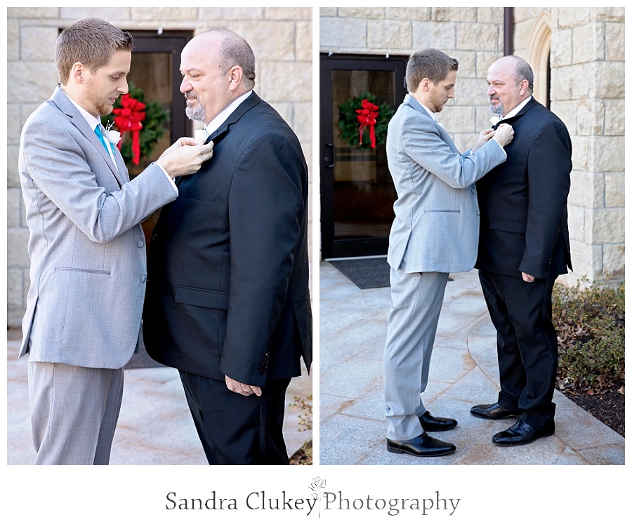 Groom helps Father with boutonniere
