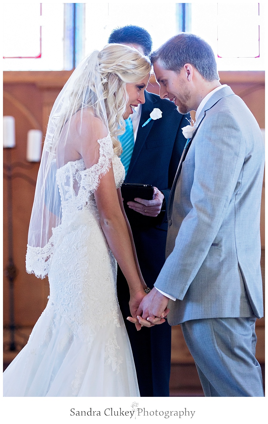 Bride and Groom pray in the chapel at Lee University