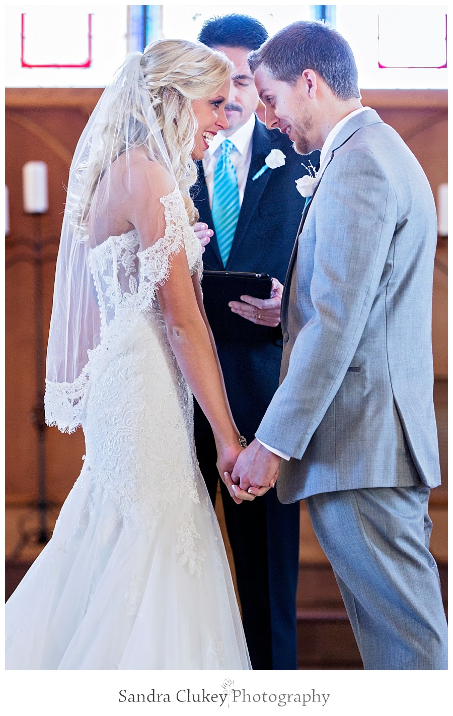 Bride and Groom pray during ceremony