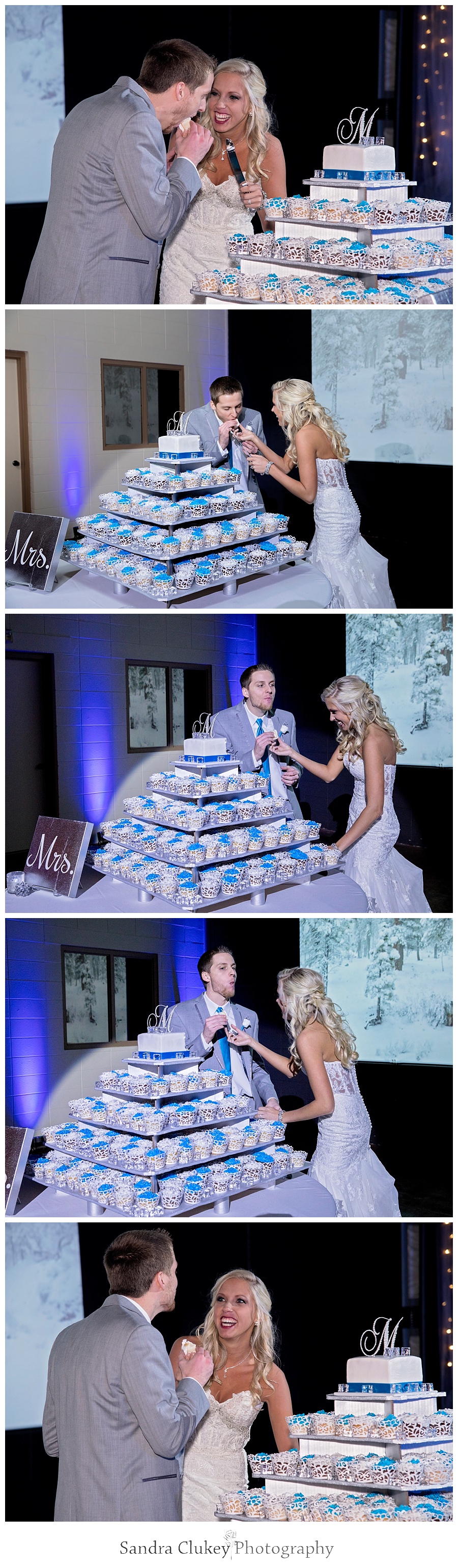 Bride and groom feed each other cake