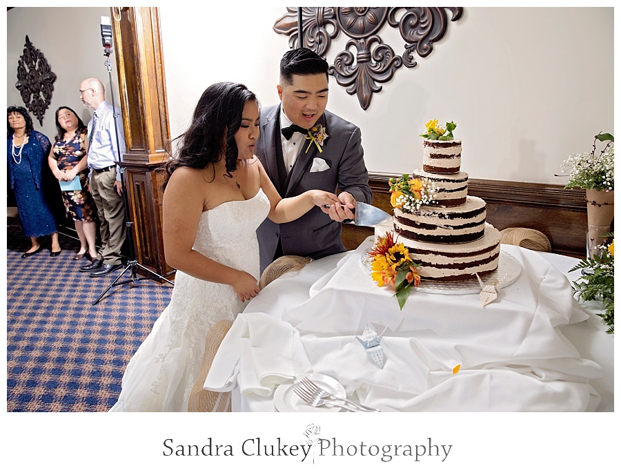 Team work cutting the cake