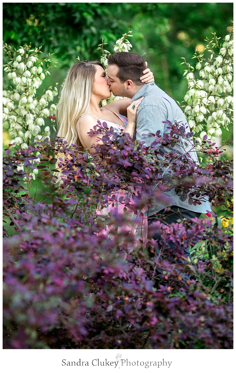 Passionate moment for couple in garden