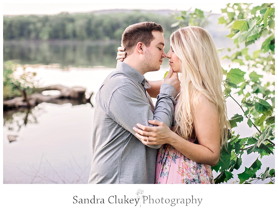 Sweet and tender moment for couple by river