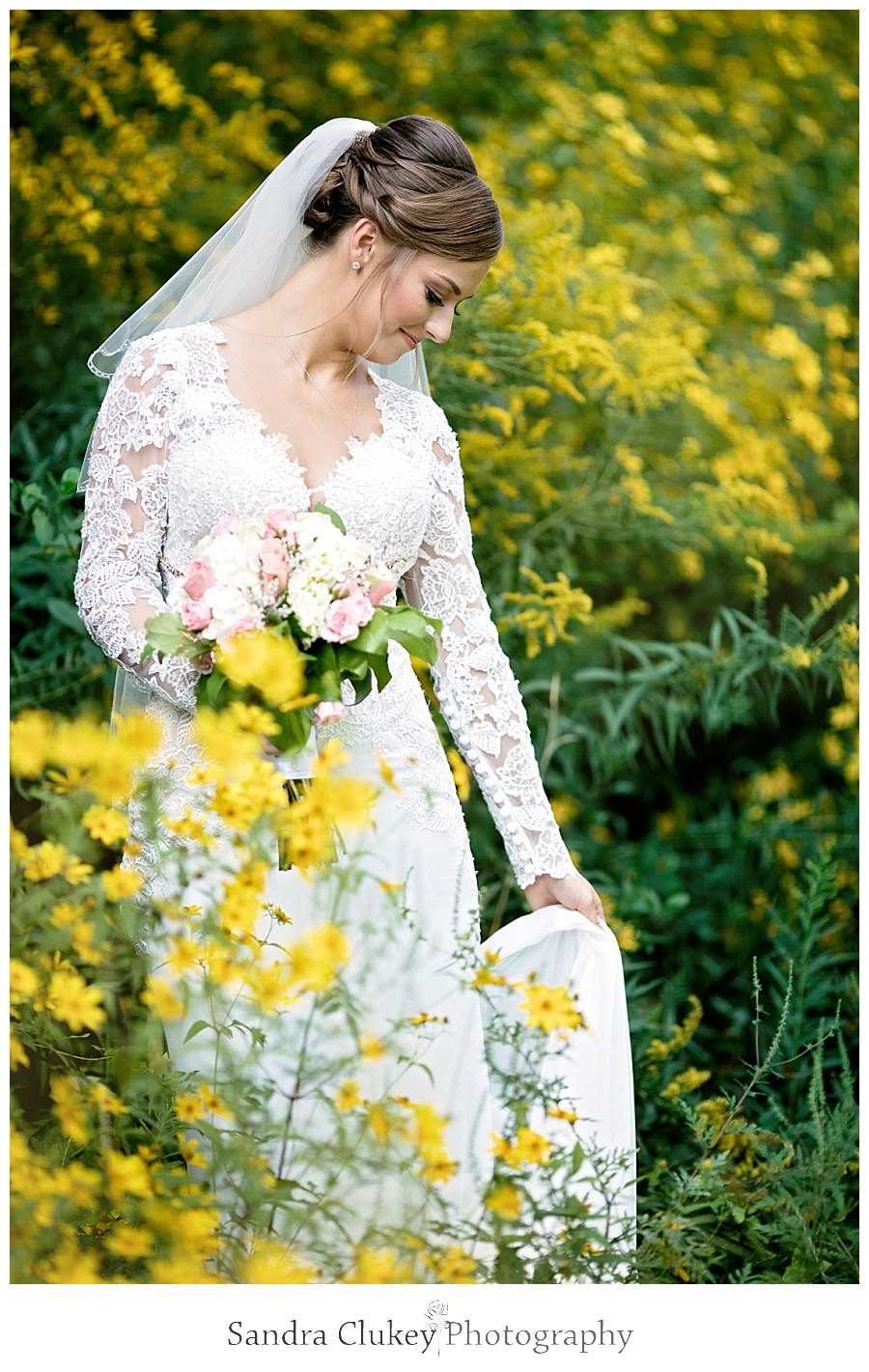 Bride in flowers at Fletcher Park