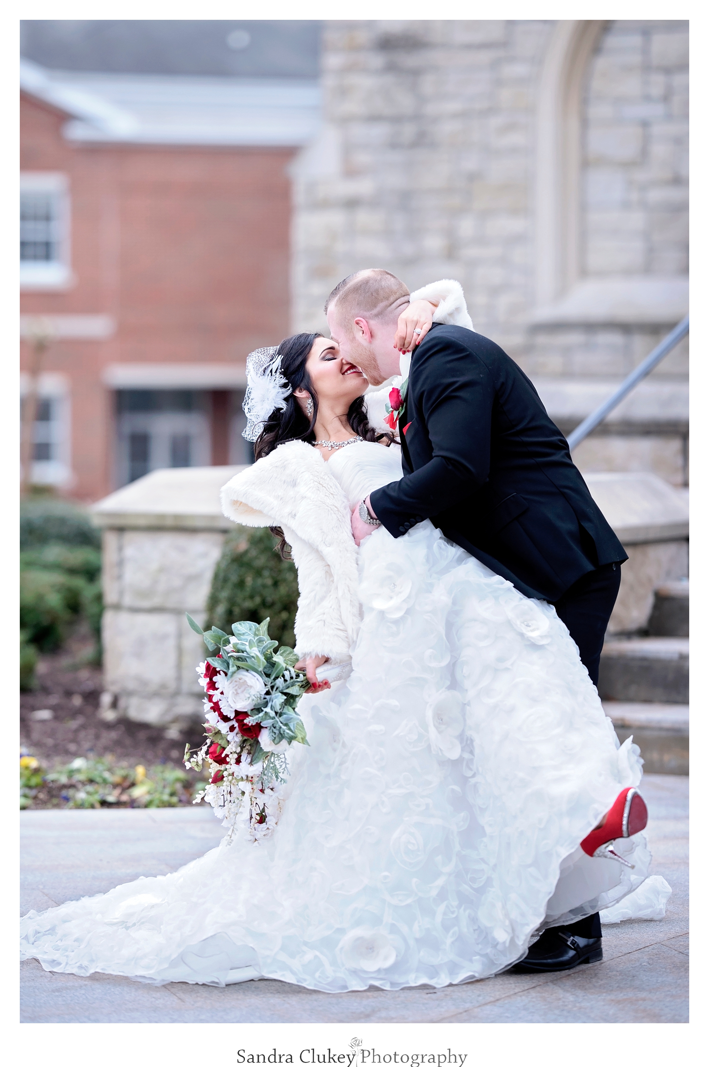 Groom and bride dip and kiss! Lee University Chapel, Cleveland TN