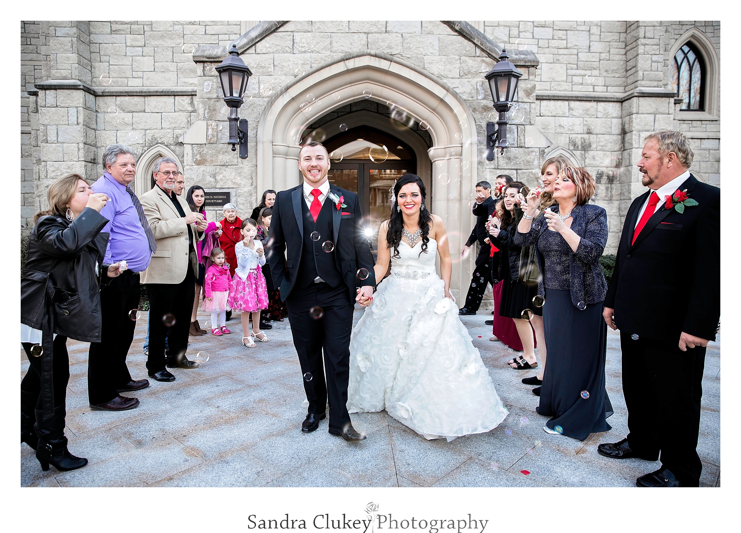 Bubbles send the happy wedding couple off at Lee University Chapel, Cleveland TN