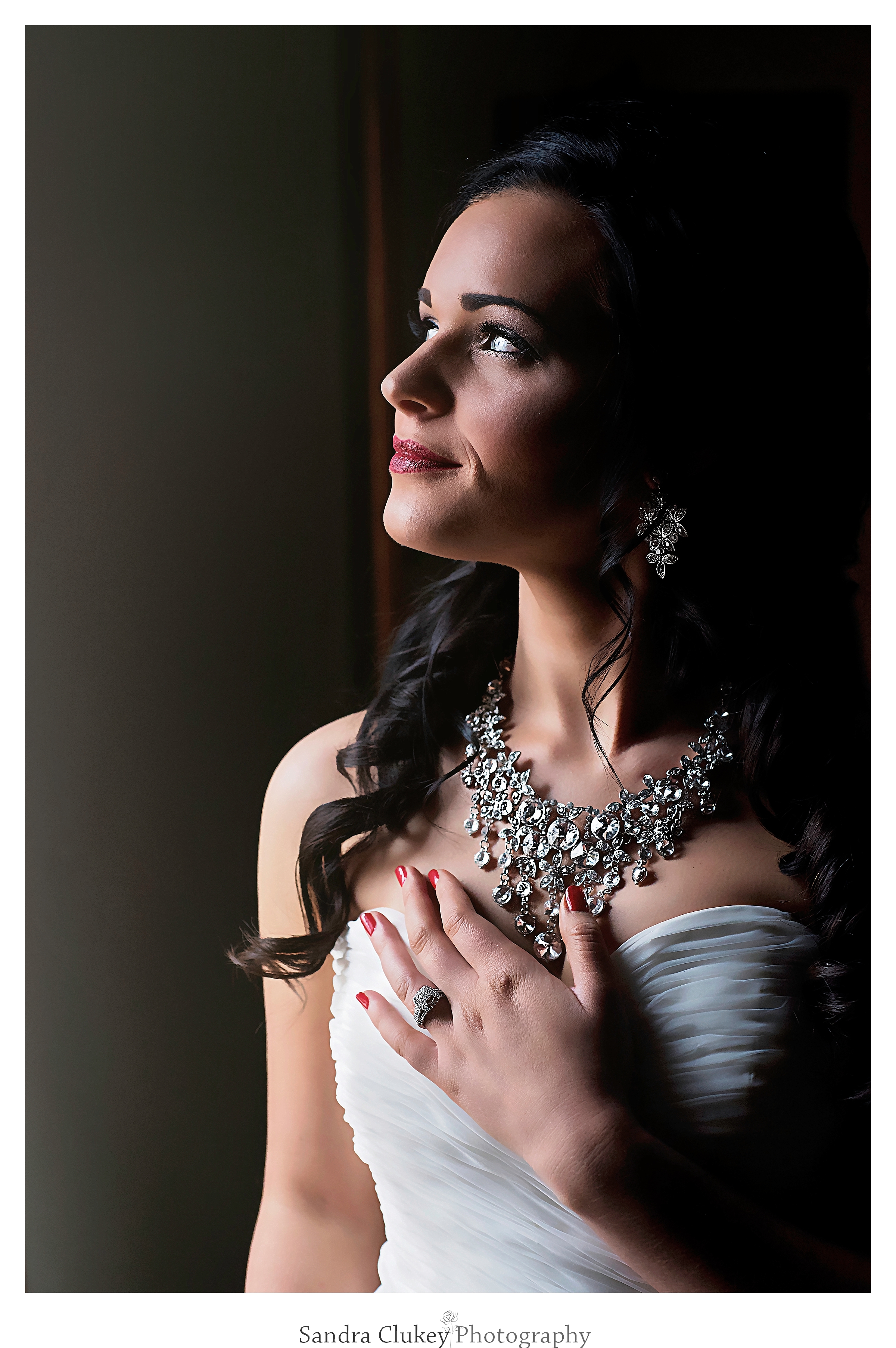 Stunning bride in deep reflection at Lee University Chapel, Cleveland TN