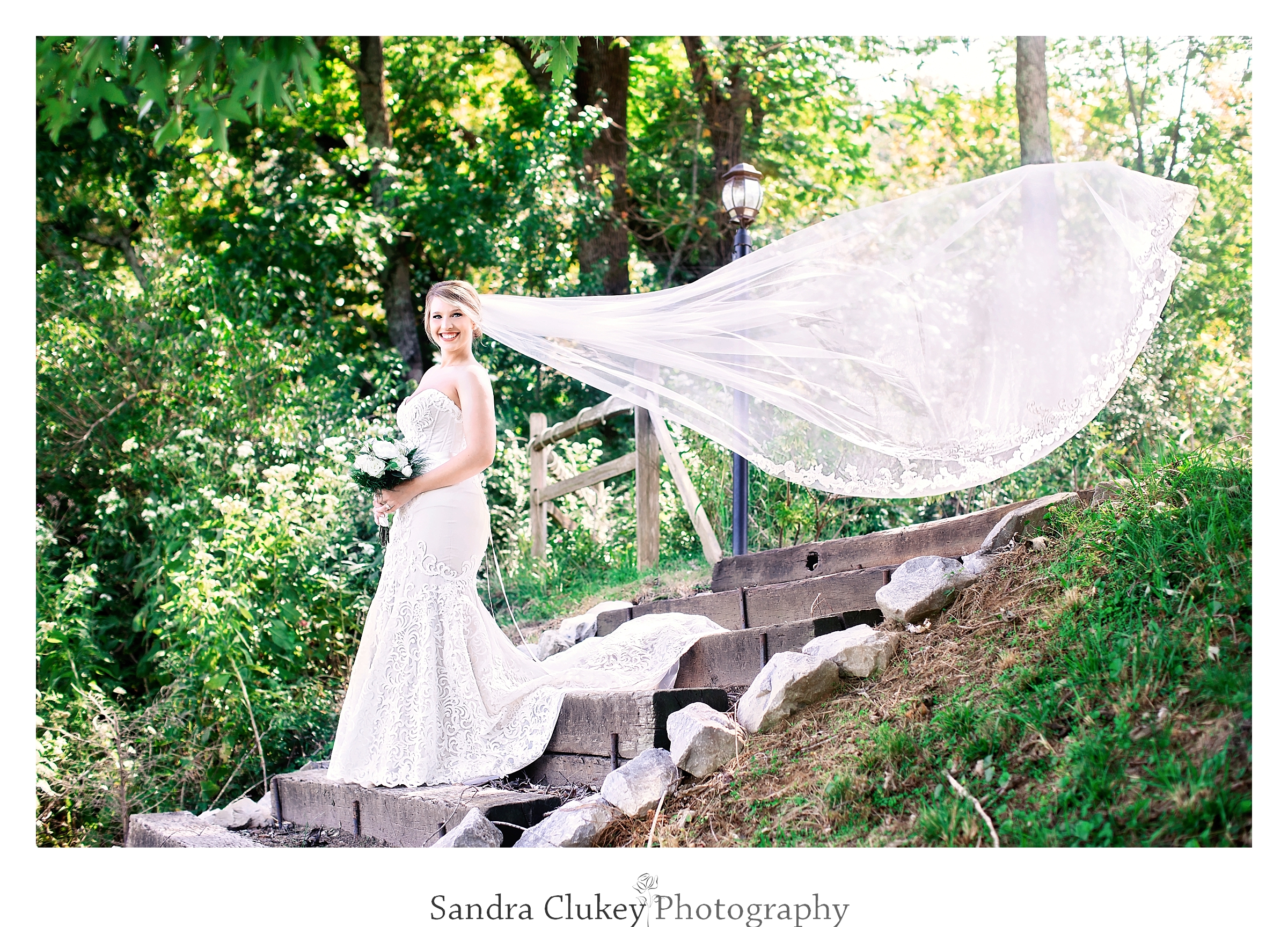 Bride descends a stairway at Tennessee RiverPlace