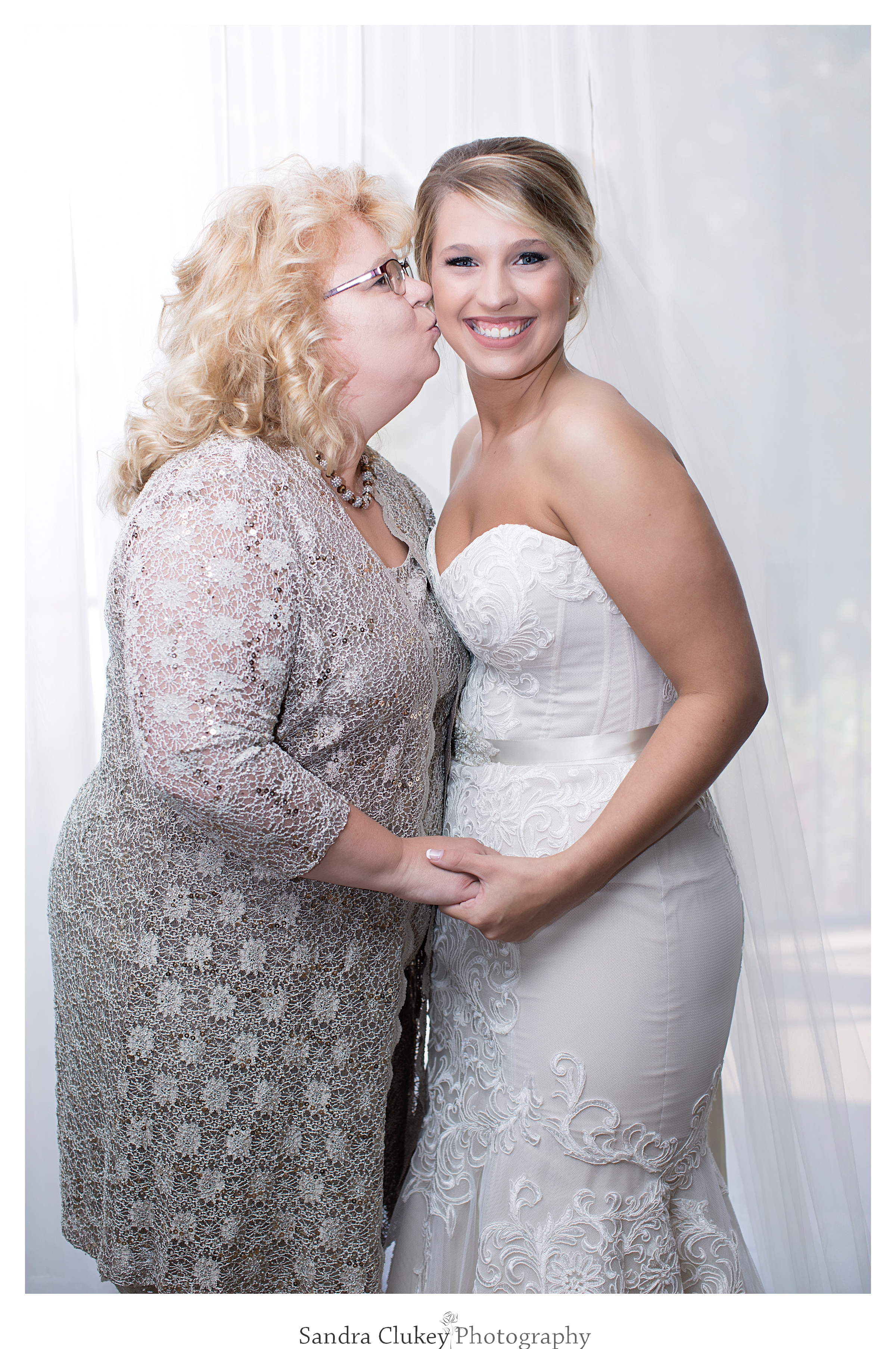 Giddy bride with Mom at Tennessee RiverPlace, Chattanooga TN