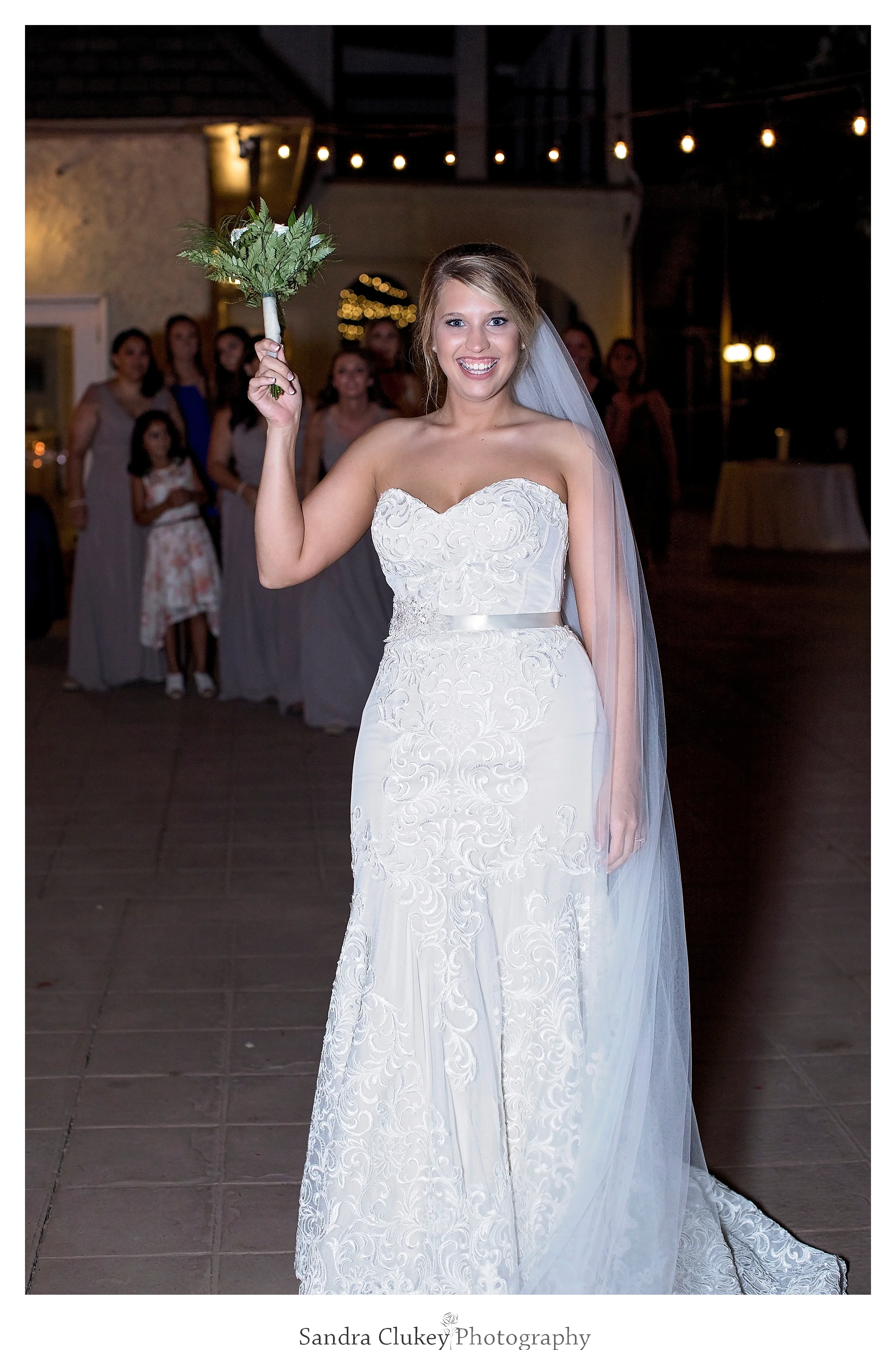 Bride preparing to toss bouquet at