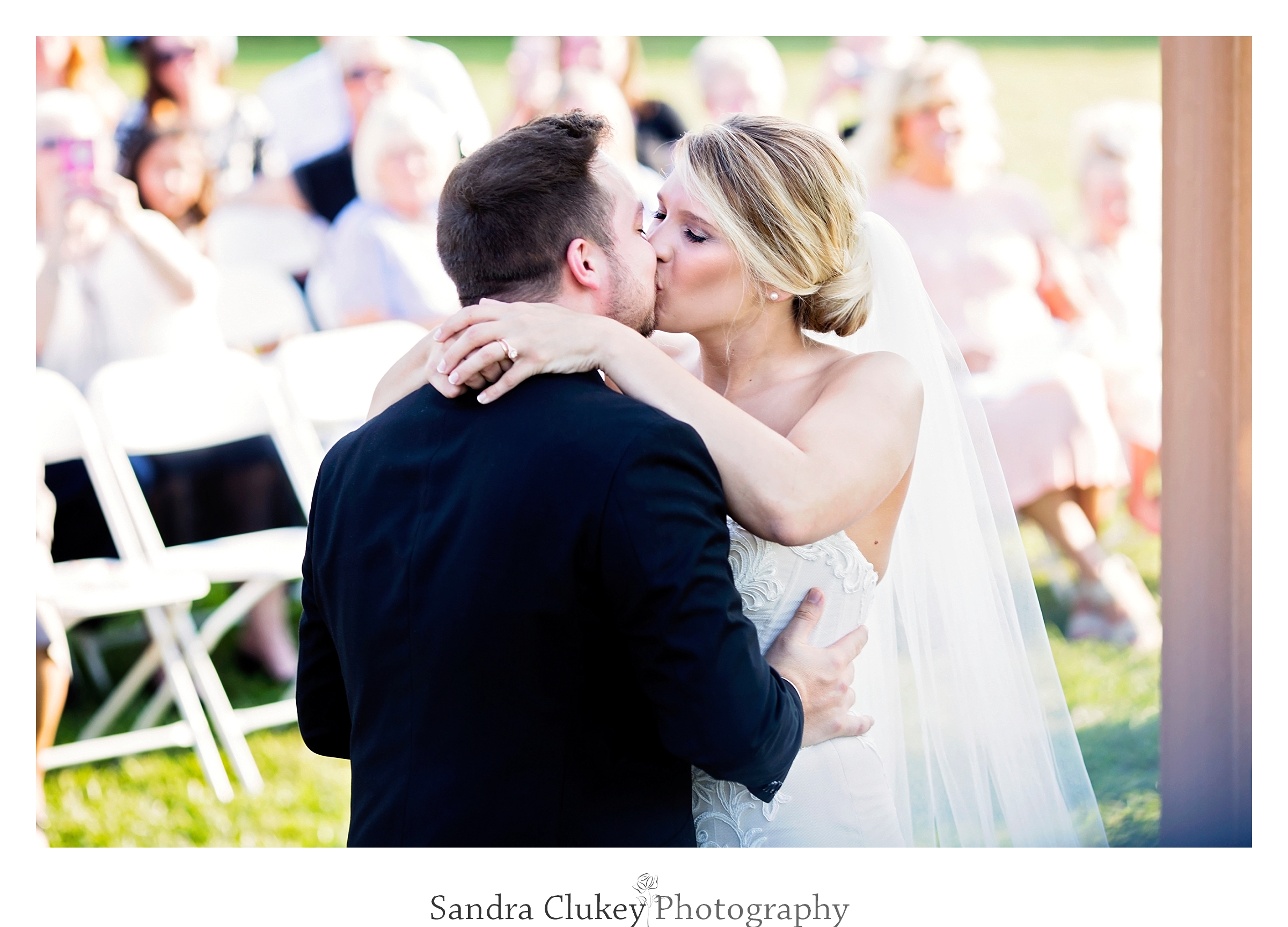 Sealed with a bride and groom kiss. Tennessee RiverPlace, Chattanooga TN