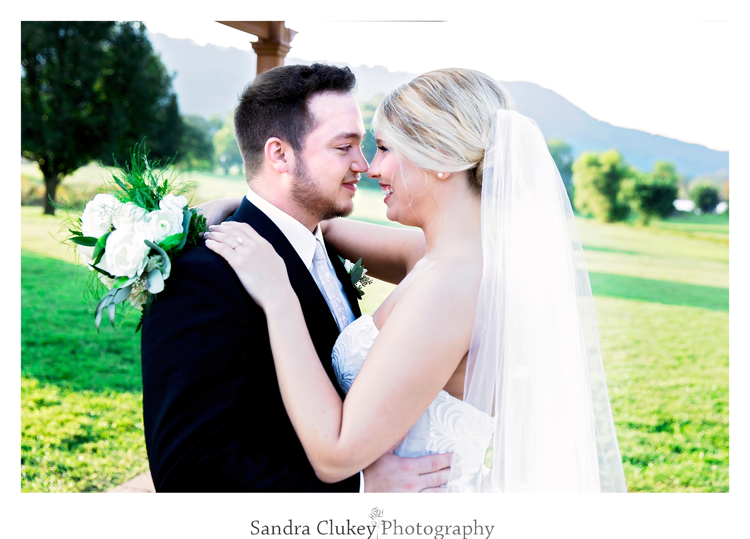 Heart felt moment between bride and groom. Tennessee RiverPlace, Chattanooga TN