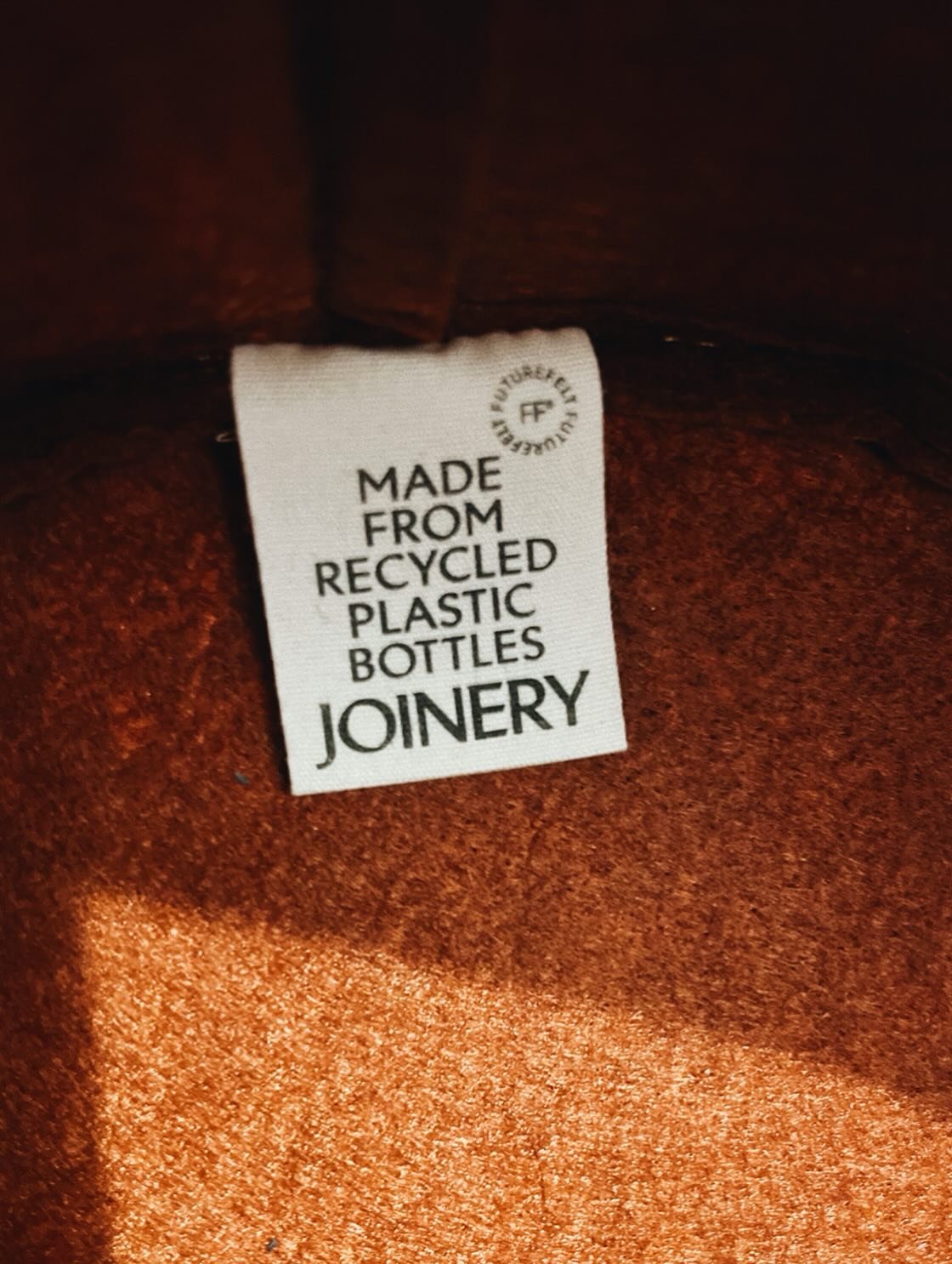 The care is in the details.

For JOINERY&rsquo;s sustainably made pieces, I crafted a bespoke care label that mirrors the same considered craftsmanship you find in every seam. Cotton fabric, and subtle nods to our black‑and‑cream palette, it all prov