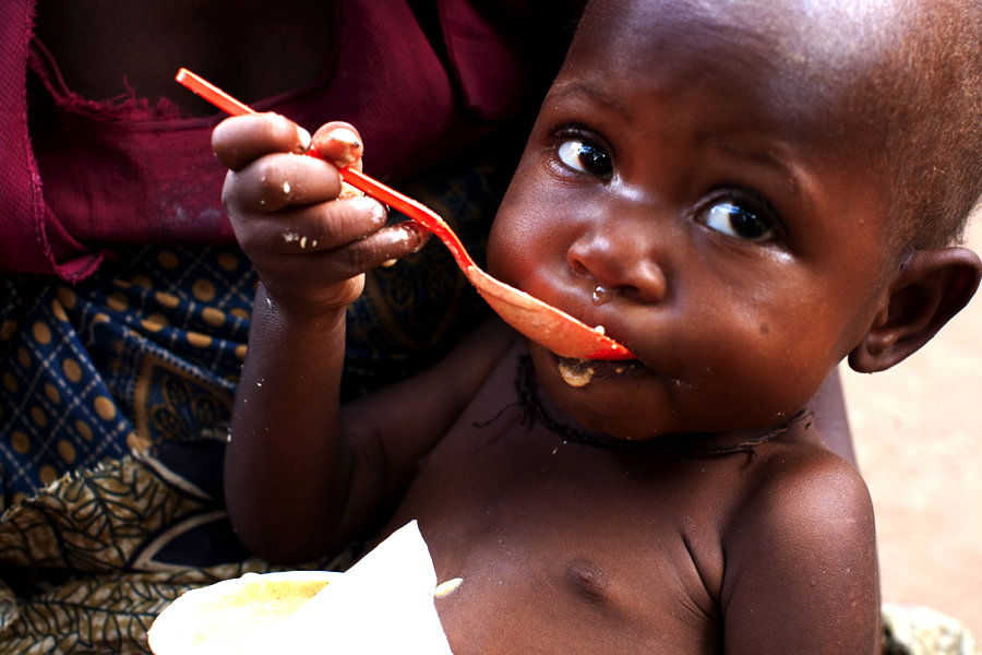 child eating RUTF6_R.png