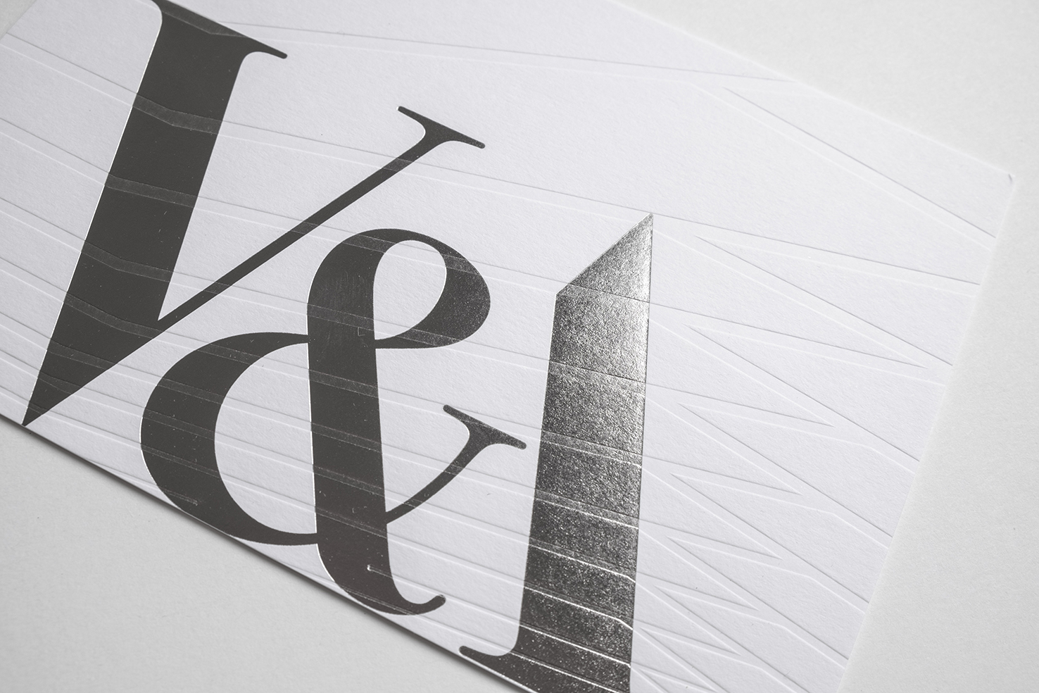 Victoria and Albert Museum Opening invitation, 2017 The V&A commissioned Margot Lombaert Studio to design invitations for two events relating to the opening of their major capital build project, the Exhibition Road Quarter. The two invitations are a graphic celebration of their new building. One invitation represents the porcelain-tiled courtyard while the second one takes its lines from the geometric ceiling of the Sainsbury Gallery.