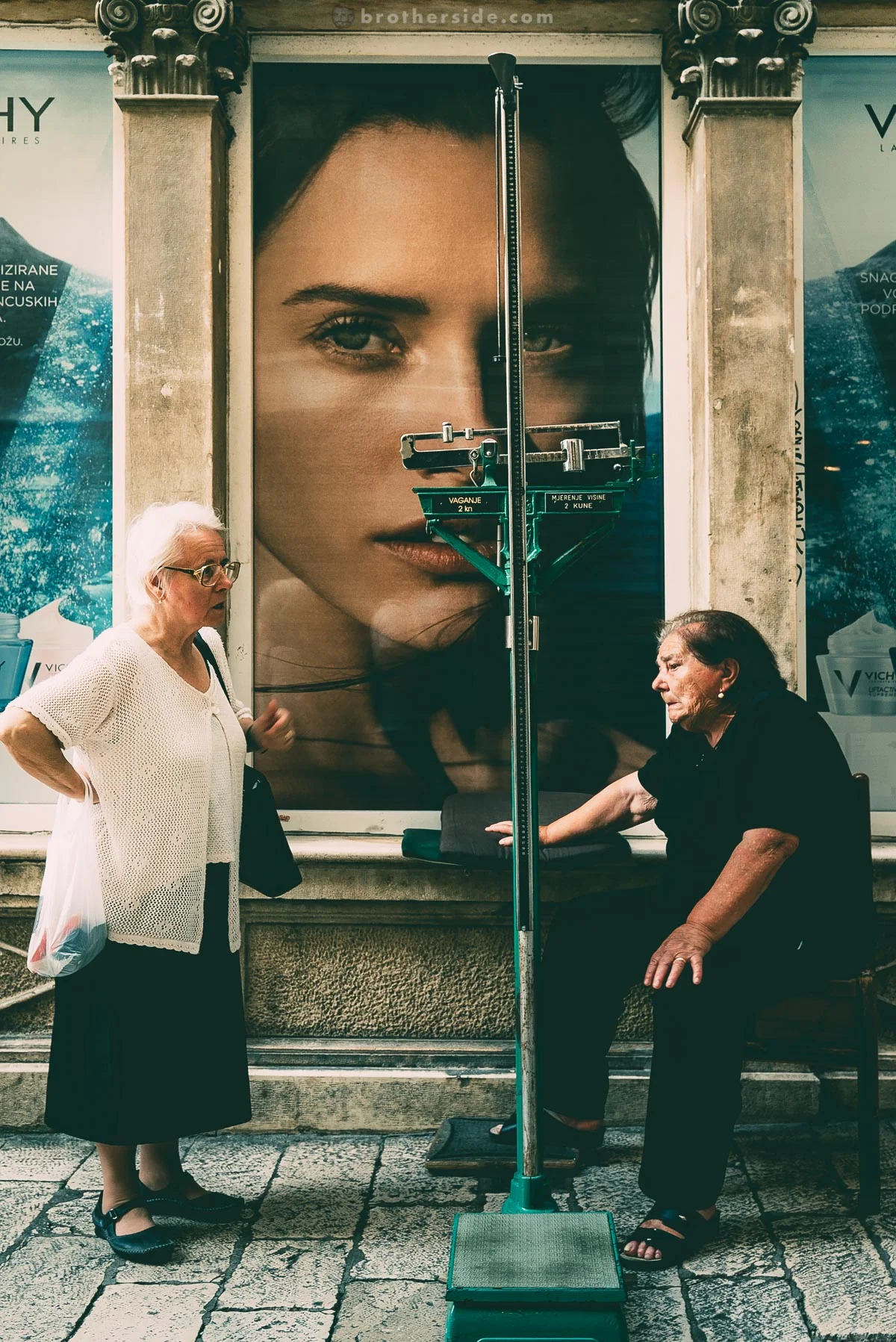 Old ladies engage in small talk while waiting for customers in search of height and weight check at one of the busiest tourist streets in Split. Despite reasonable pricing (0.3 EUR each), there was no interest in 15 minutes I spent observing the situation. An estimated 20% of Croatians live below the poverty line, compared to 4% in 1999.
