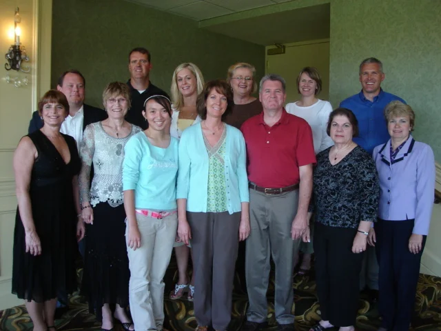 From Left to Right Front Row: Nancy Johnson, Ardel Benston, Shelly Chan, Susan Birkley, Lowell Birkley, Mycki Nissen, Diane Bousquet Back Row: Chris Bengston, Tim Murphy, Sarah Thesenga, Sara Yeager, Molly Brennen-Egdorf Not Shown: Patrick O' Halloran