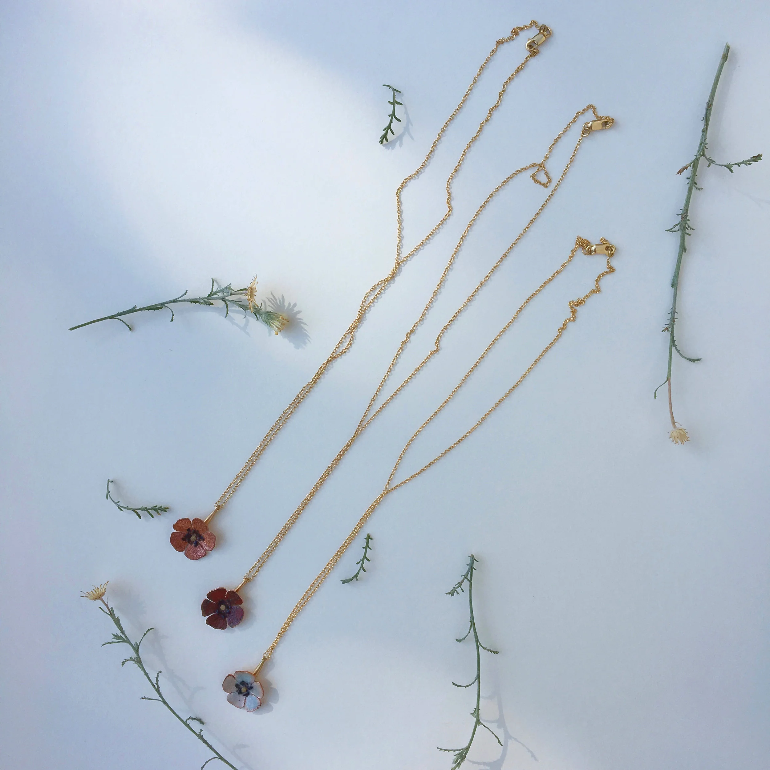 three necklaces with chains.jpeg