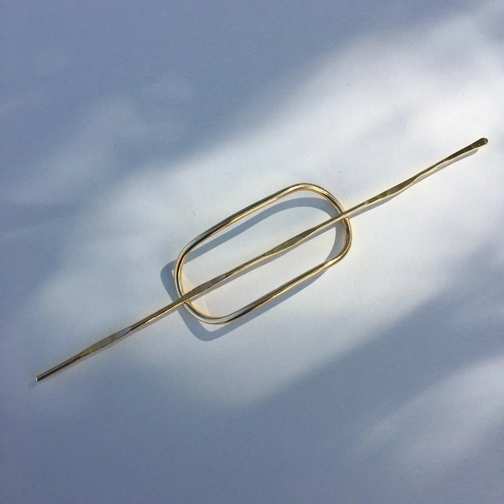 Beat the heat and put your hair up with the Simple Poke Pin