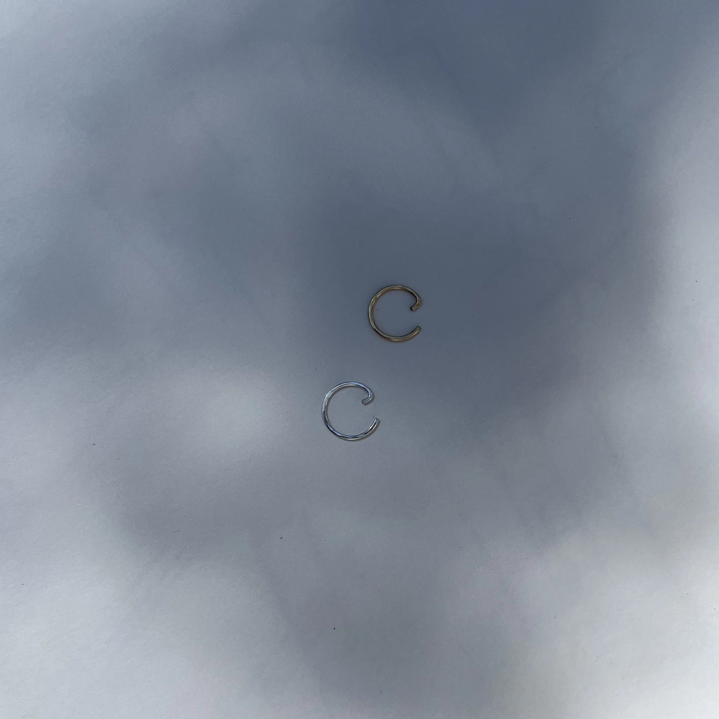 hammered tiny huggie hoops by Sophie Kissin Jewelry.jpg