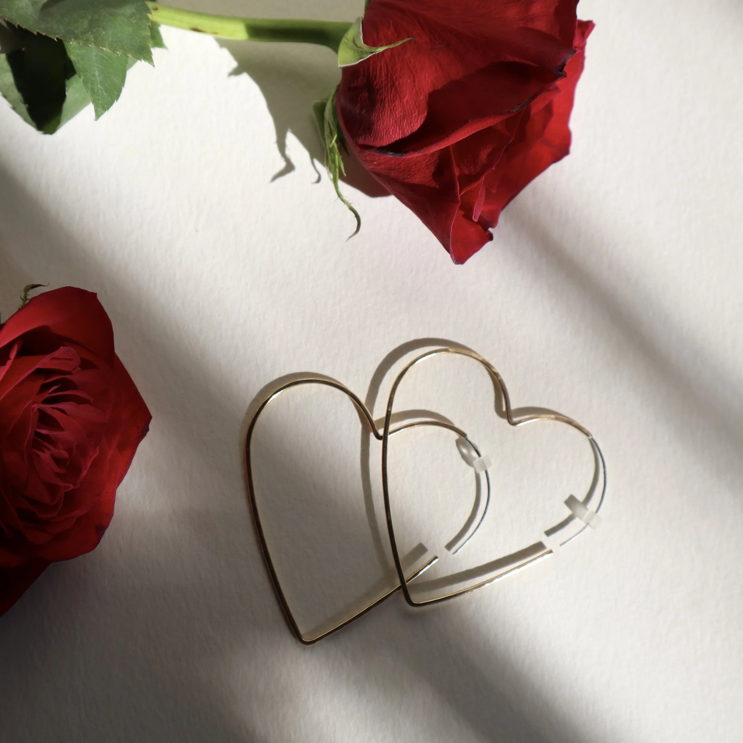 brass with rubber stops big heart hoops.JPG