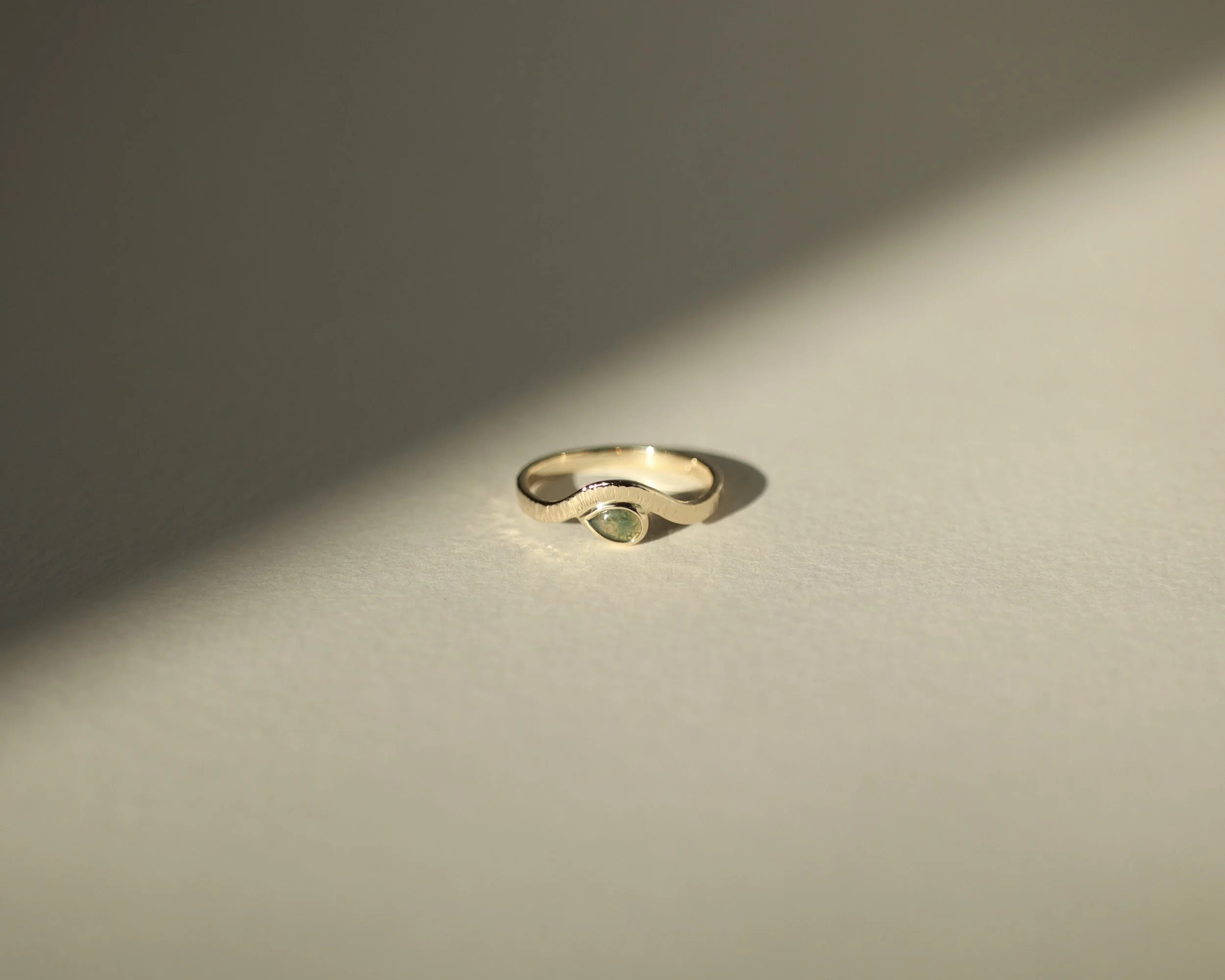 Moss agate pear cabochon with lined hammered texture gold engagement ring for Briana