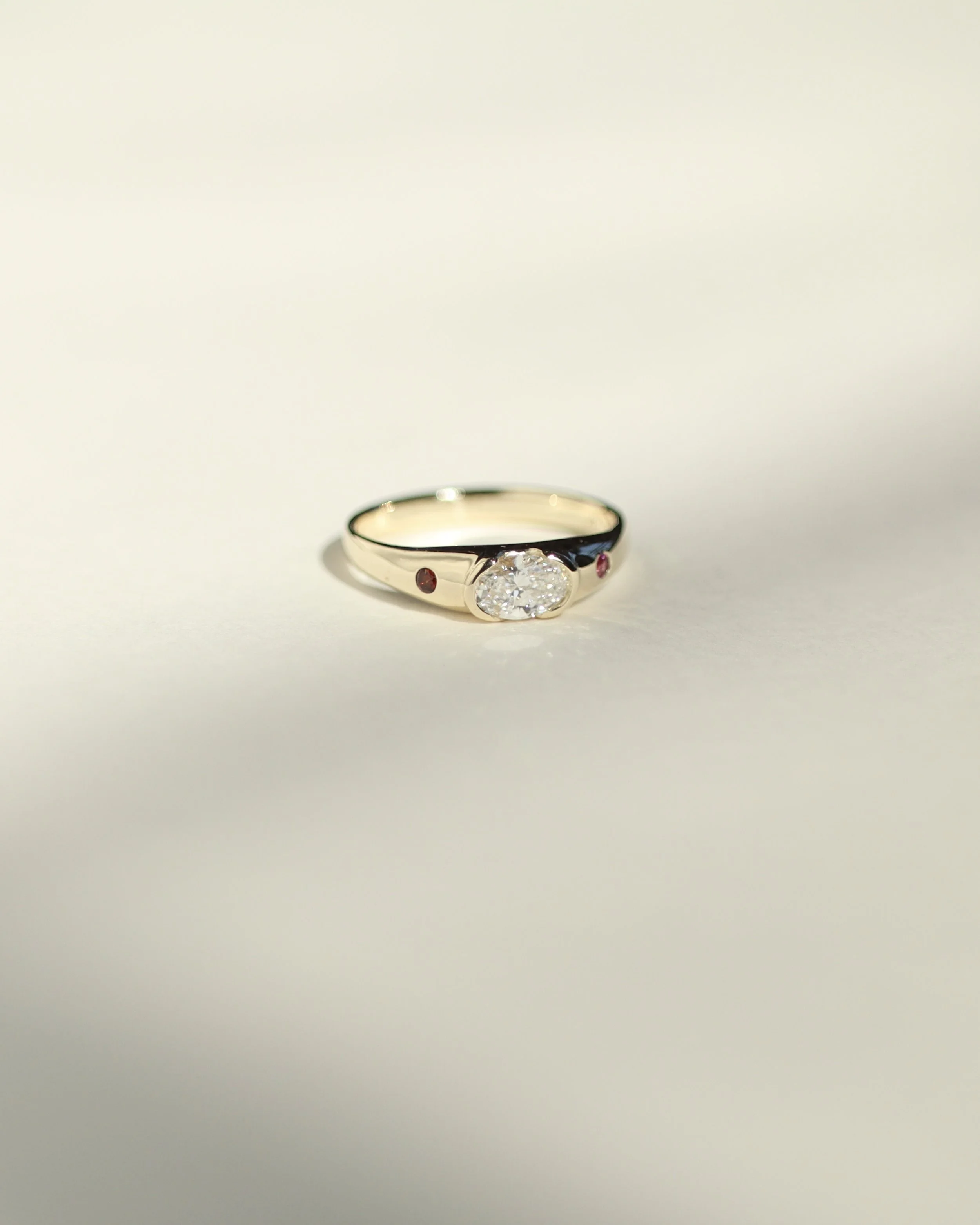 10k gold oval lab diamond with garnet and ruby birthstones engagement ring for Suzie