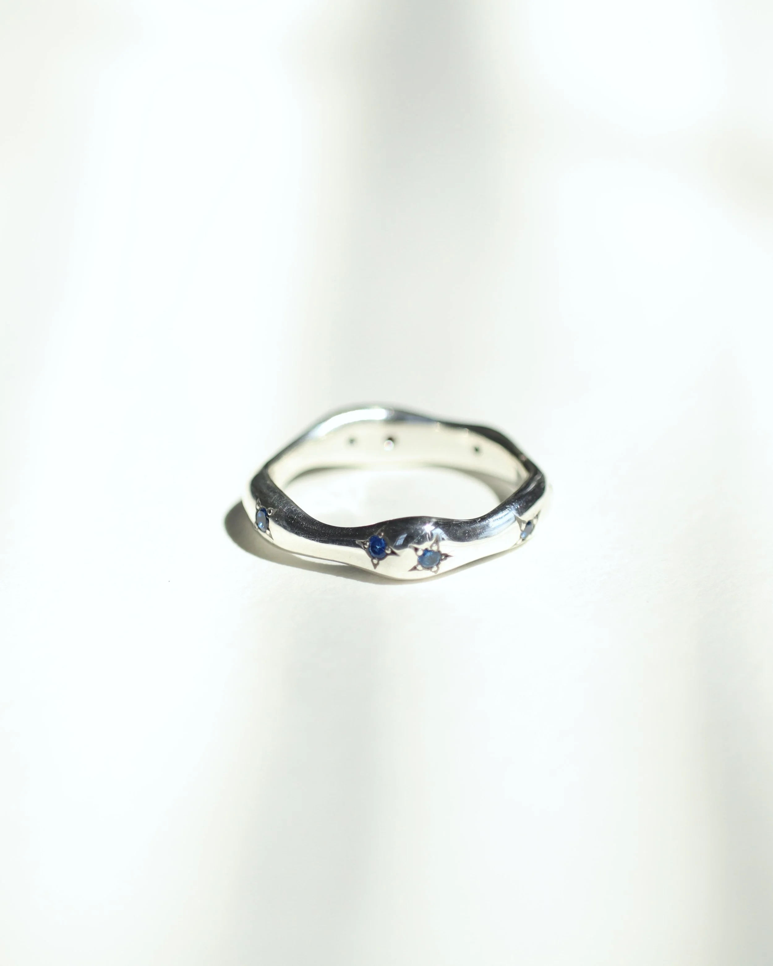 Constellation ring with heirloom sapphires and rubies for Lillyan