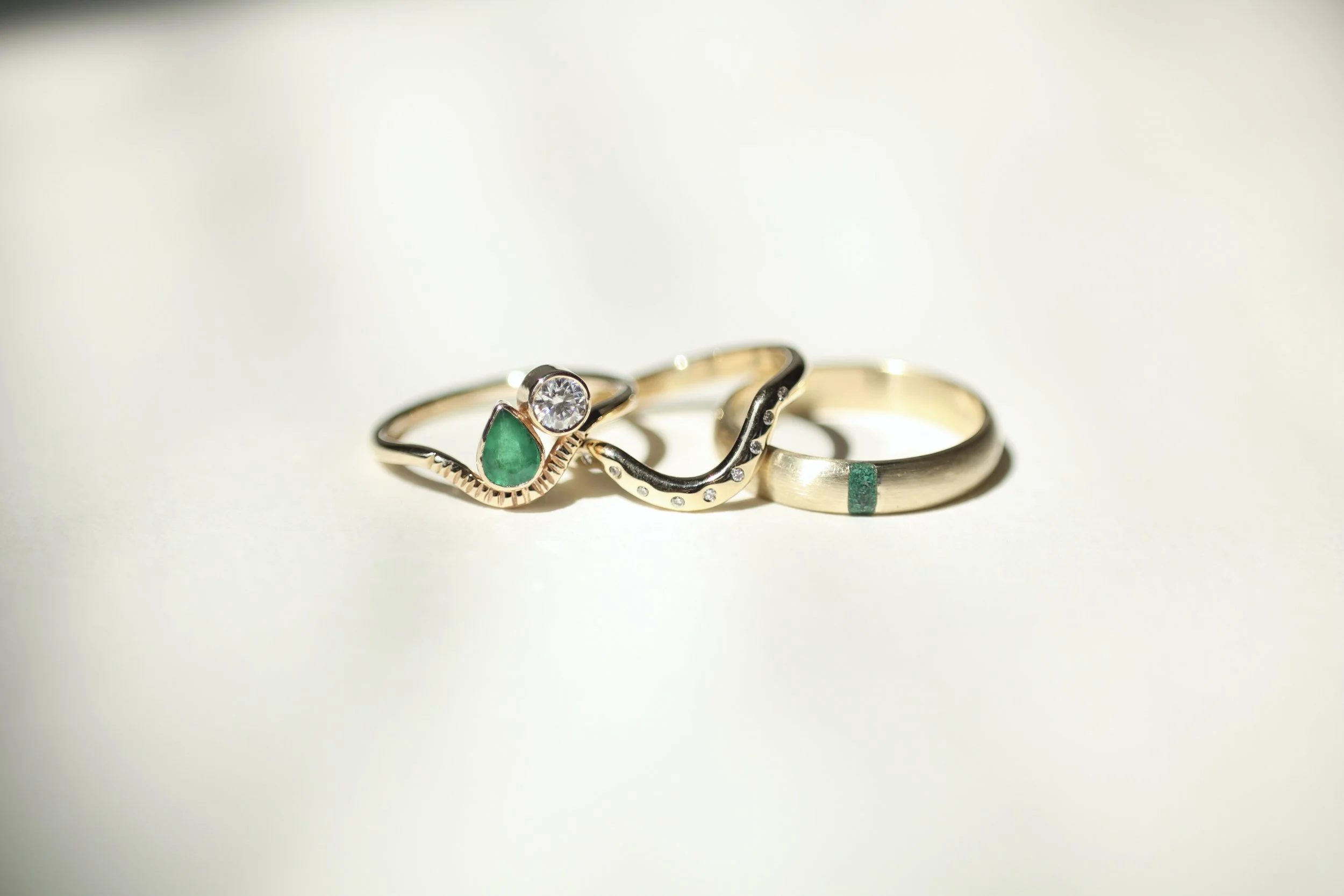 Emerald, moissanite, lab diamond band, malachite inlay wedding band set for Caitlin & Patrick