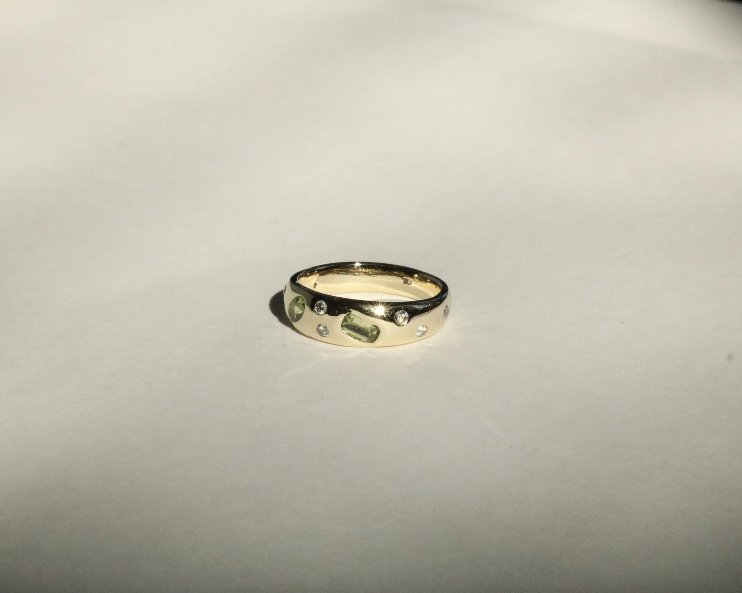 Heirloom redesign with diamonds and peridot in 18k yellow gold for Mary Reagan