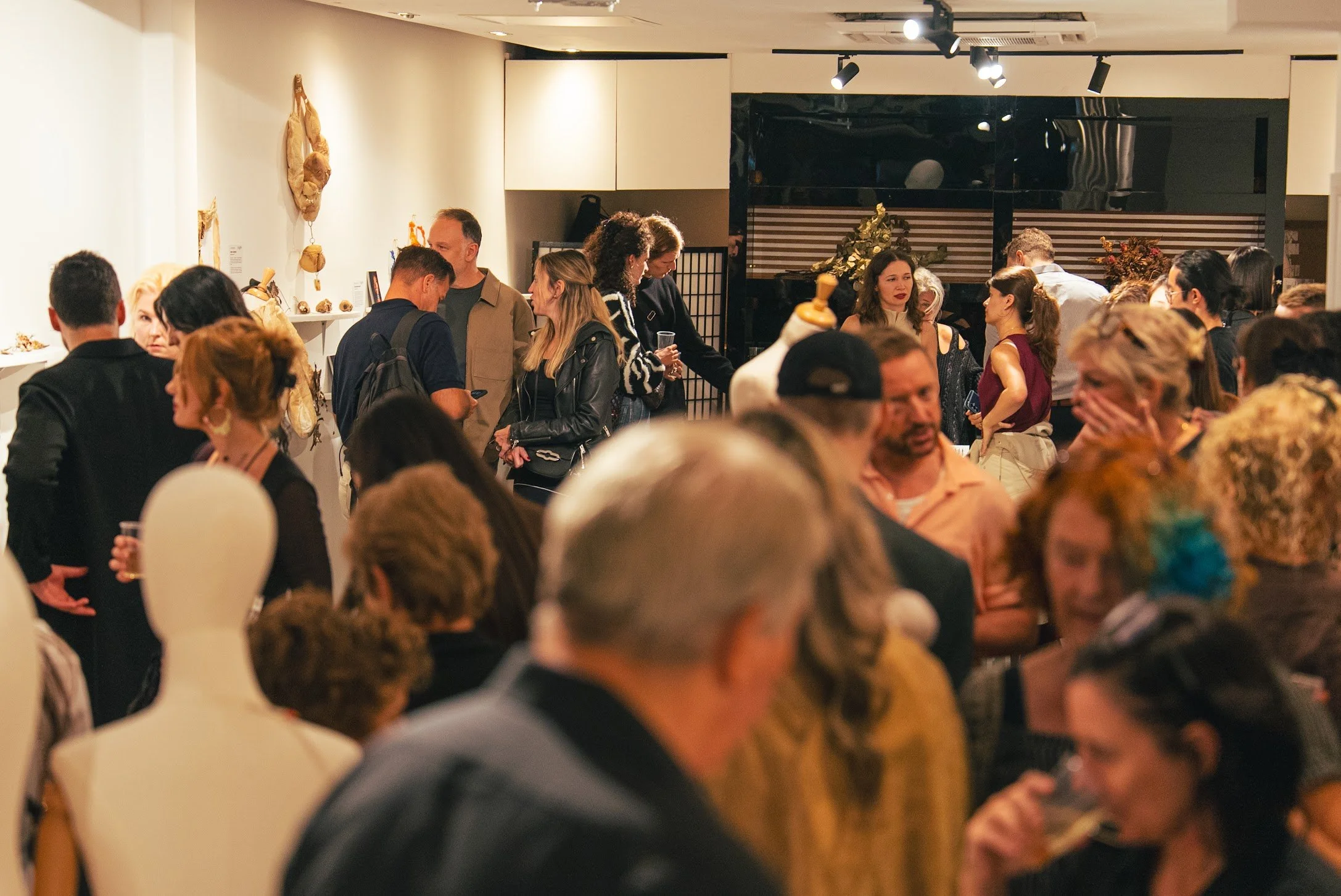 Bustling opening night at Cluster's Amalgam Jewelry Fair.JPG