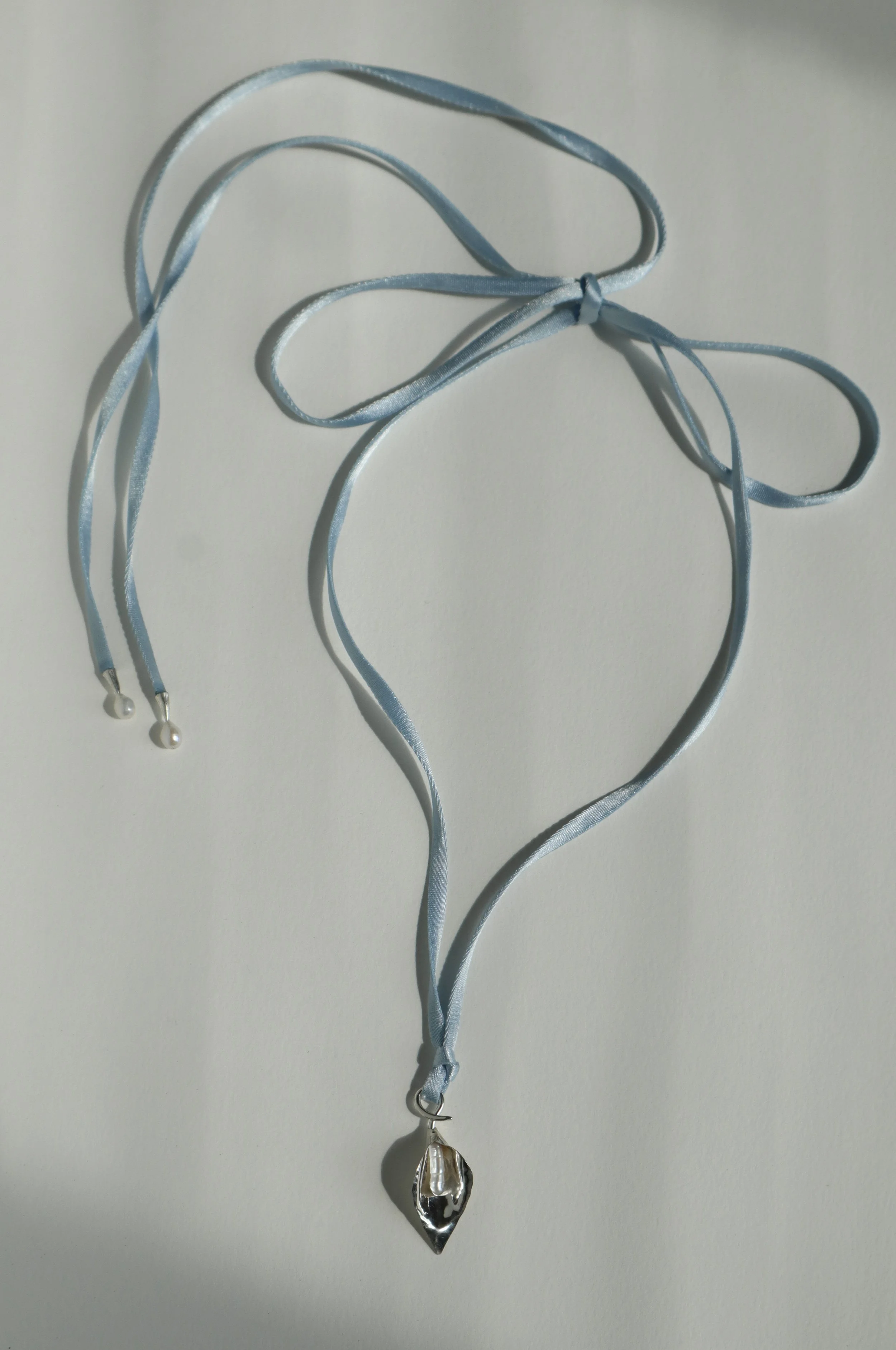 blue ribbon calla lily necklace bow.JPG