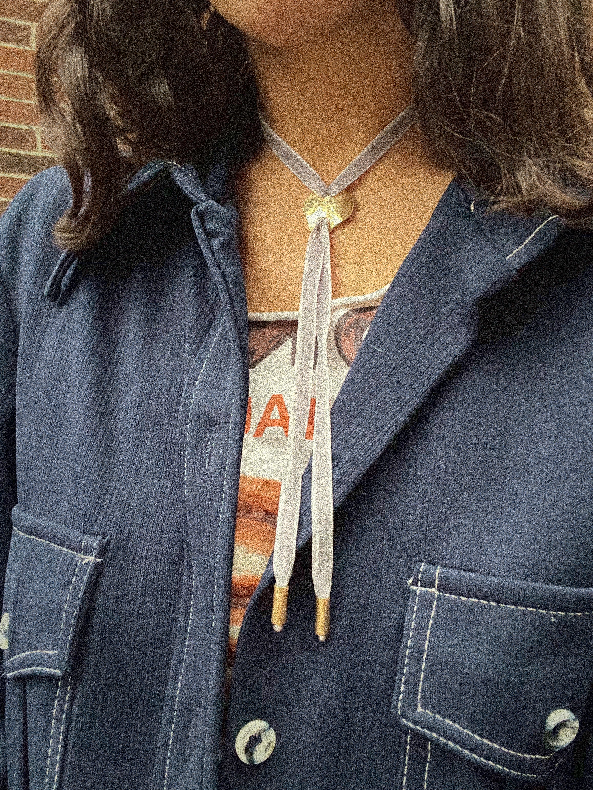 gray ribbon bolo necklace pearl tipped Sophie Kissin Jewelry.jpeg