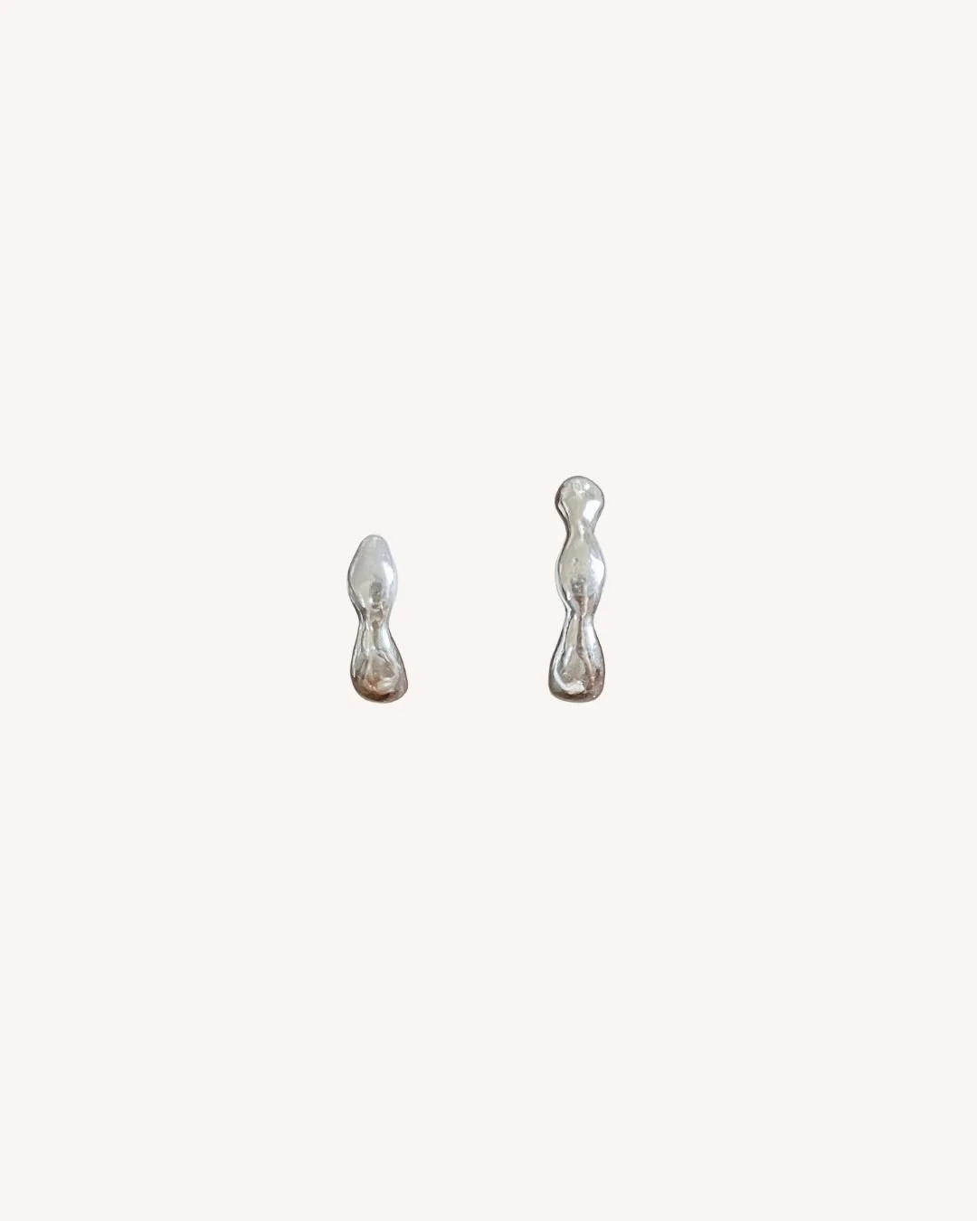 sand cast asymmetrical blob silver earrings Sophie Kissin Jewelry.jpg