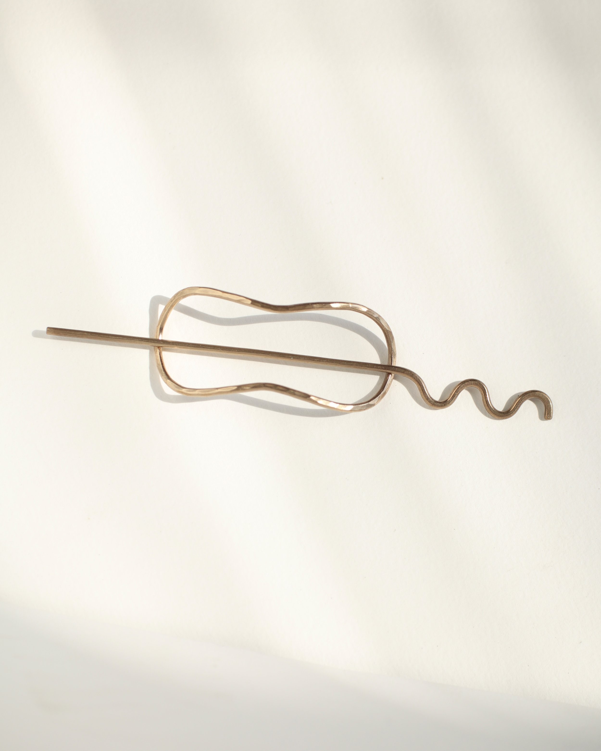 squiggle poke pin on white Sophie Kissin Jewelry.JPG