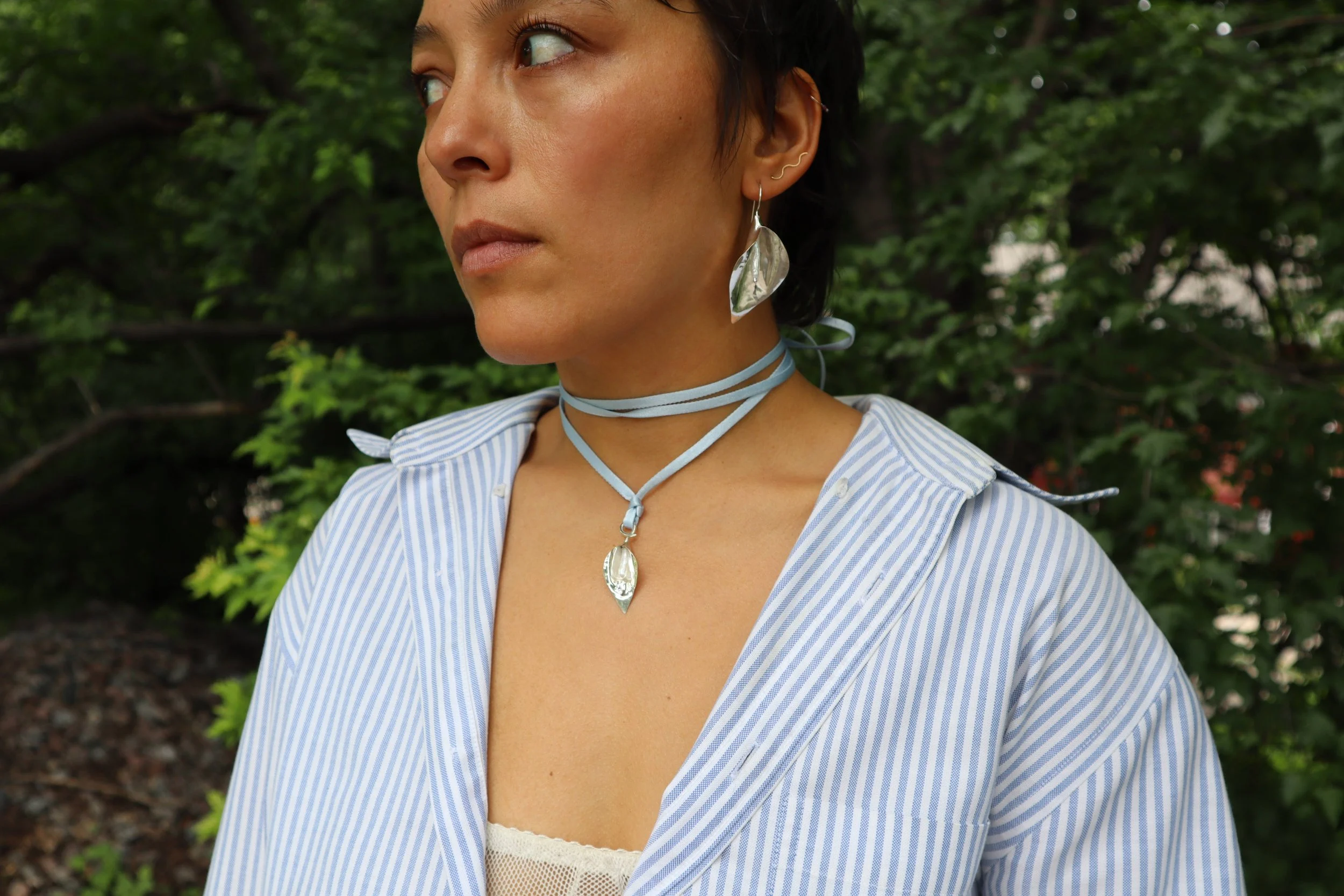blue ribbon choker calla lily necklace wrapped and tied back bow Sophie Kissin Jewelry.jpeg