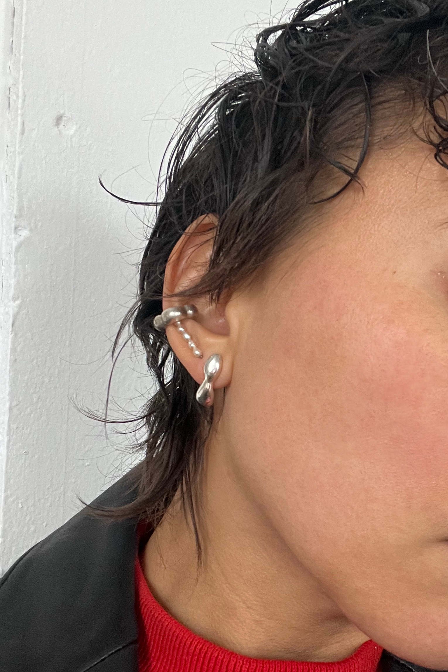 sand cast asymmetrical stud earrings silver 1.jpeg