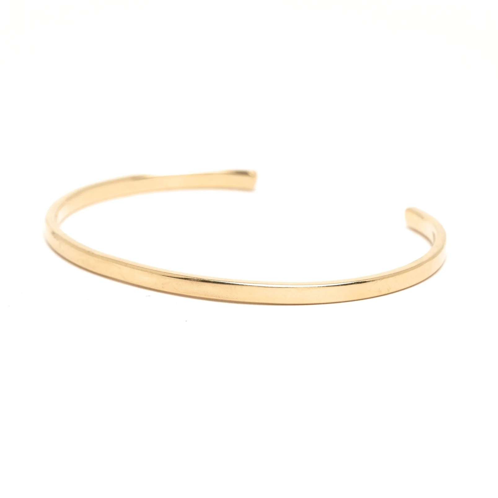Simple Cuff 18k YG Angle.jpg