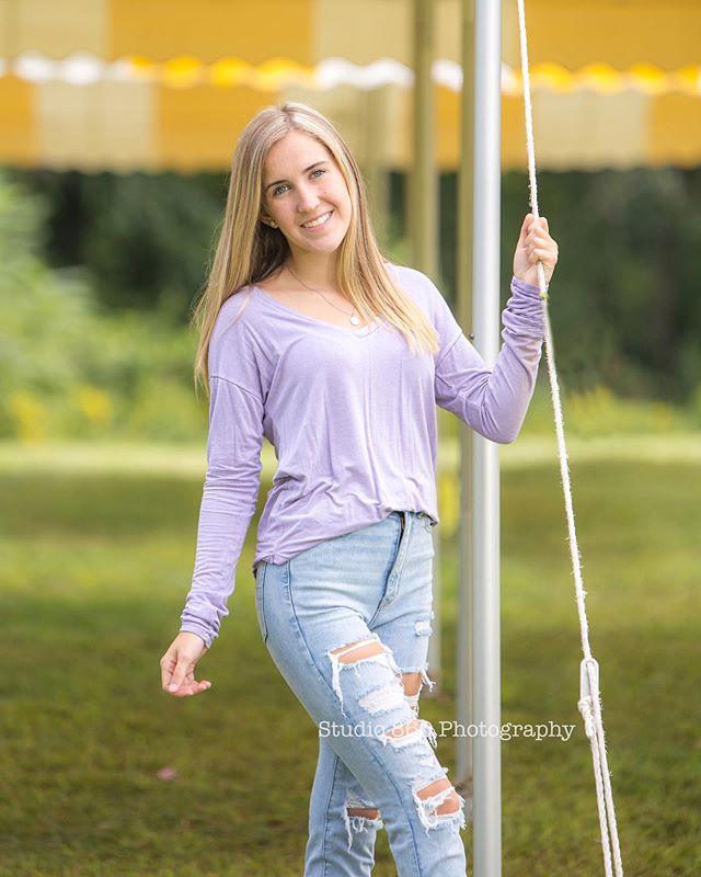 A sneak peek of my senior session with Jenna.  She was super easy to photograph!  I loved this yellow tent that happened to be set up for an event at the farm we were at, so fun.