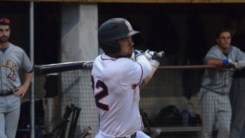 Mark Hurley drives home Brennan Metzger with an RBI single in the seventh. Hurley had three hits on the night. James Toy III/Sonoma Stompers