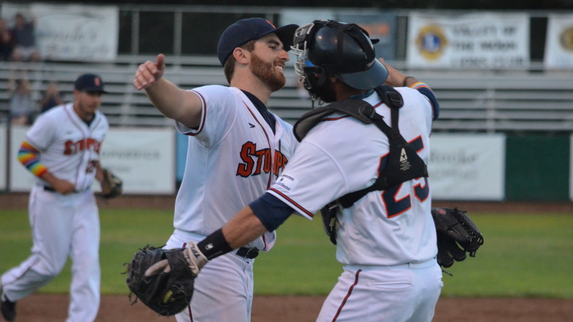 Sean Conroy and Isaac Wenrich hug after Conroy's historic start on Thursday night. James Toy/Sonoma Stompers via AP
