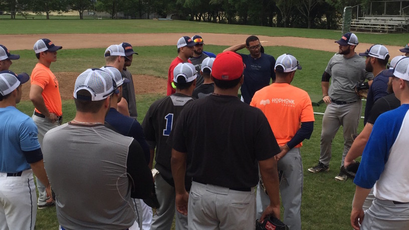 Players gather around manager Fehlandt Lentini on the first day of Spring Training. Tim Livingston/Sonoma Stompers