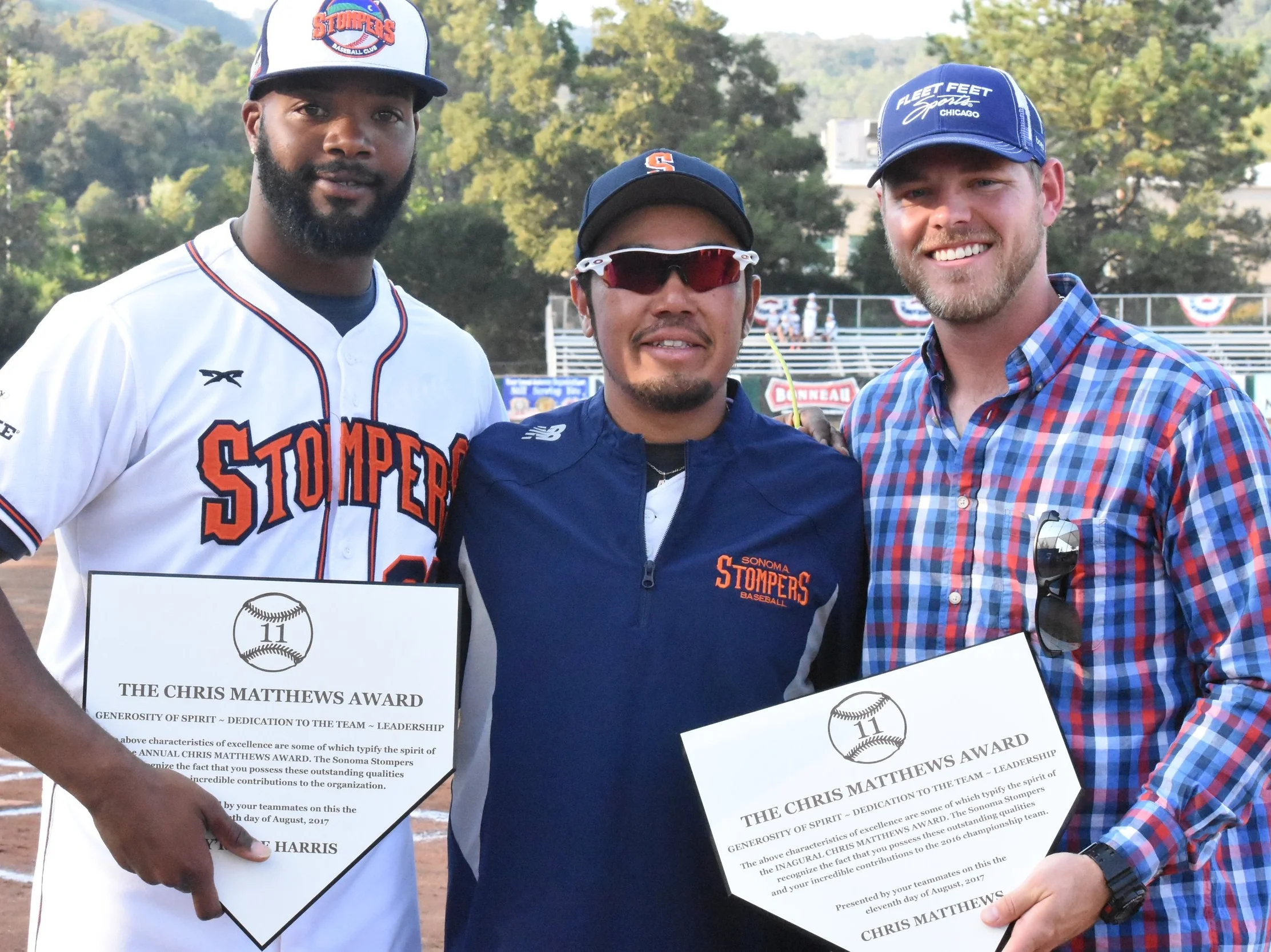 Pitcher Ty'Relle Harris and 2016 bench coach Chris Matthews pose with manager Takashi Miyoshi after accepting their Chris Matthews Awards in a pre-game ceremony on Friday. (James W. Toy III / Sonoma Stompers)