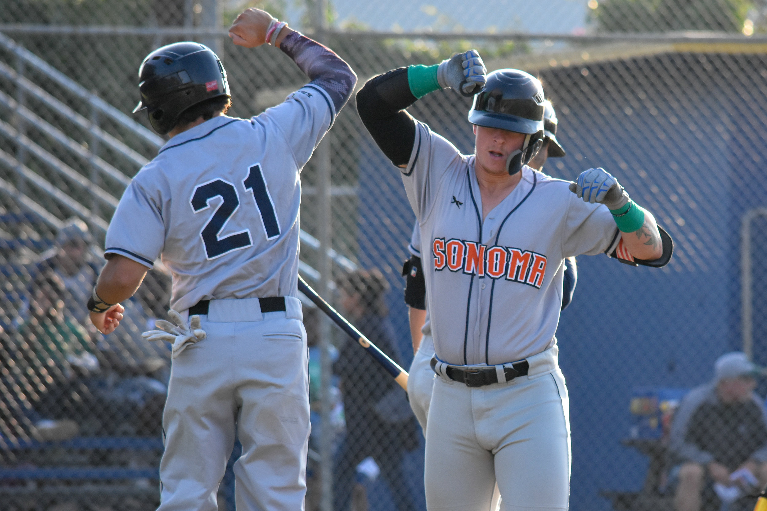 Kam Stewart celebrates with Rob DeAngelis (21) after hitting his 10th home run of the season, a two-run shot in the first inning of the Sonoma Stompers game against the Vallejo Admirals, August 15, 2018 in Vallejo, Calif.(James W. Toy III / Sonoma Stompers)