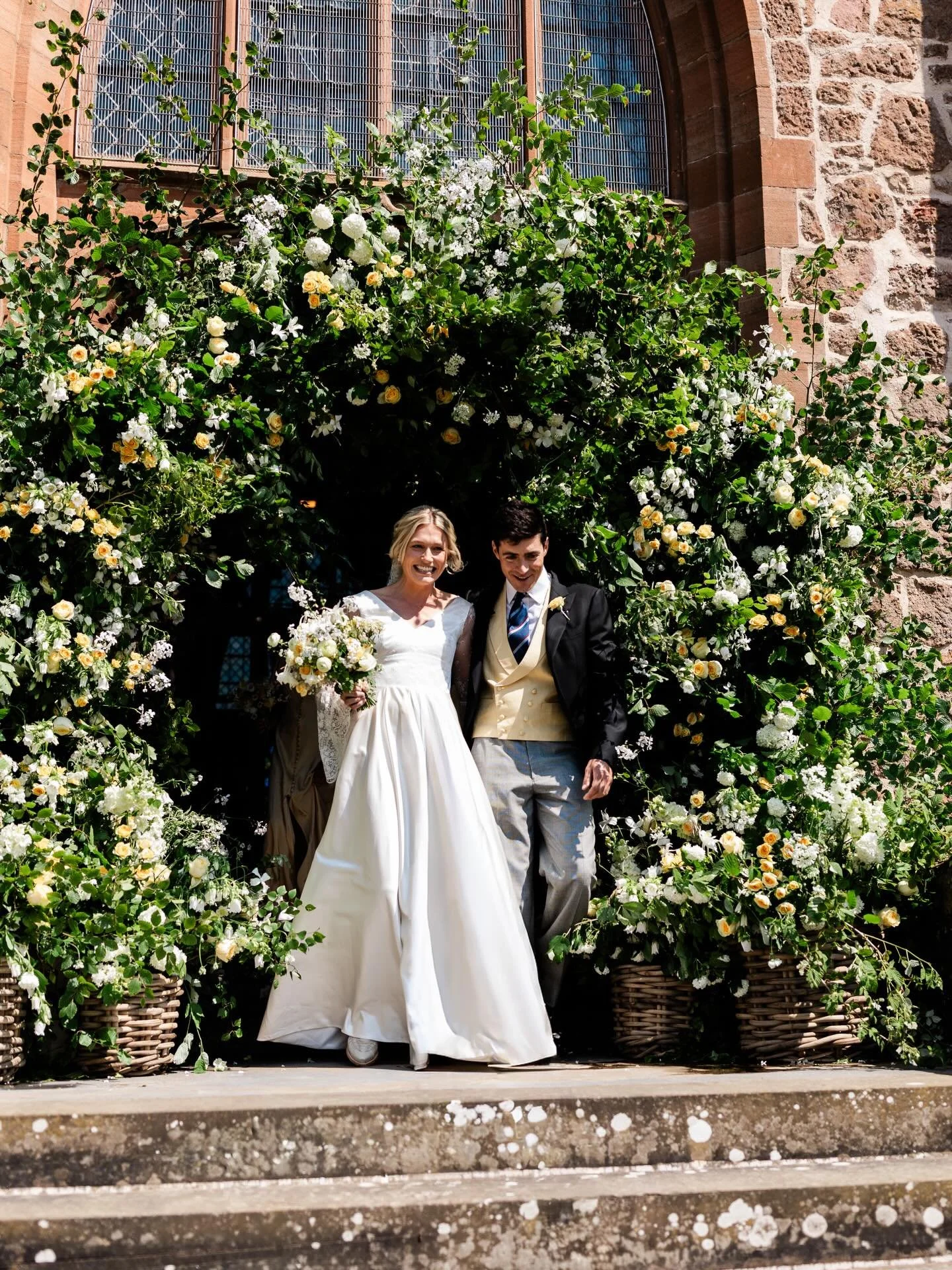Molly &amp; James&rsquo;s summer wedding to brighten up your screens, look at this stunning flower arch by @myrtleandbracken 

#weddingphotographerscotland #perthshireweddings #rottalsteading